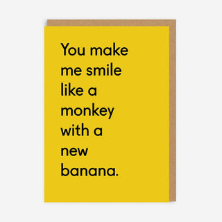 Monkey With A New Banana Greeting Card